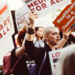 Activists rally for improved Medicare for All in 2017 in Los Angeles